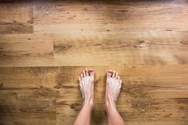 Underfloor heating can work with real wood flooring, but you need to take precautions.