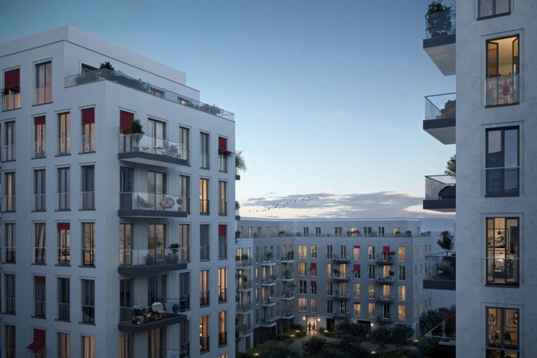 Condominiums sharing the beautiful Berlin dusk out at the new build property development project "No. 1 Charlottenburg from ZIEGERT real estate.