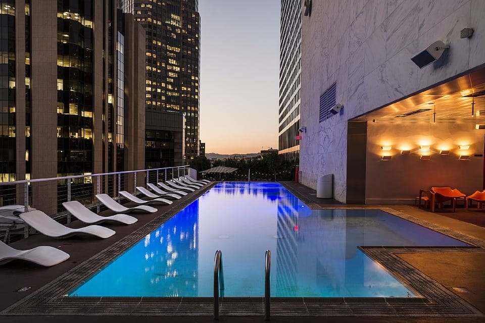 An example of communal property in co-owned real estate: a residents' rooftop pool in an inner-city apartment block.