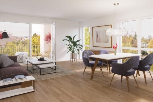 Heller Wohn-Essbereich mit hochwertigem Parkett im Neubau.