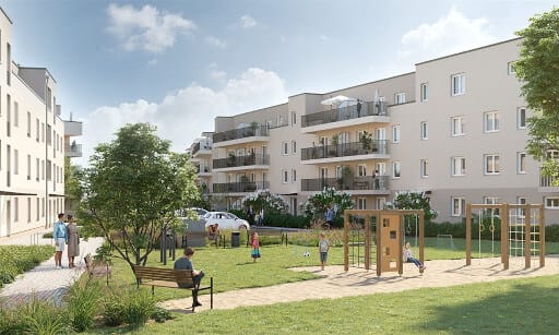 Eine moderne Wohnanlage mit Spielplatz im begrünten Innenhof. Spielplätze gleich Gemeinschaftseigentum in der WEG.